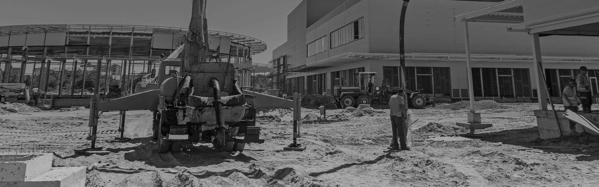 crane with outrigger jacks on construction site